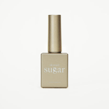 Bottle of glitter gold gel nail polish from Skynailbysugar