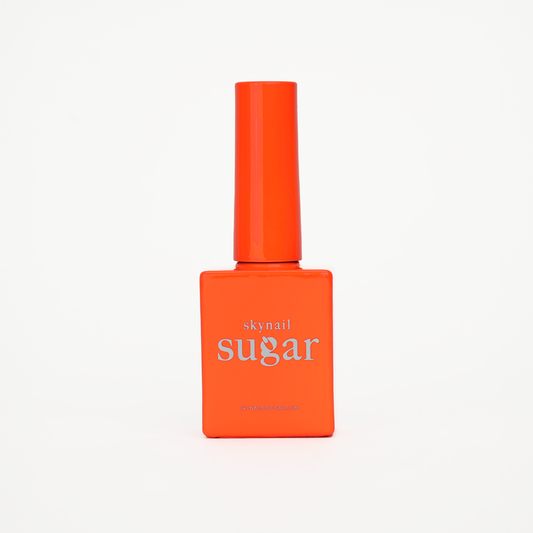 Bottle of neon orange gel nail polish from Skynailbysugar